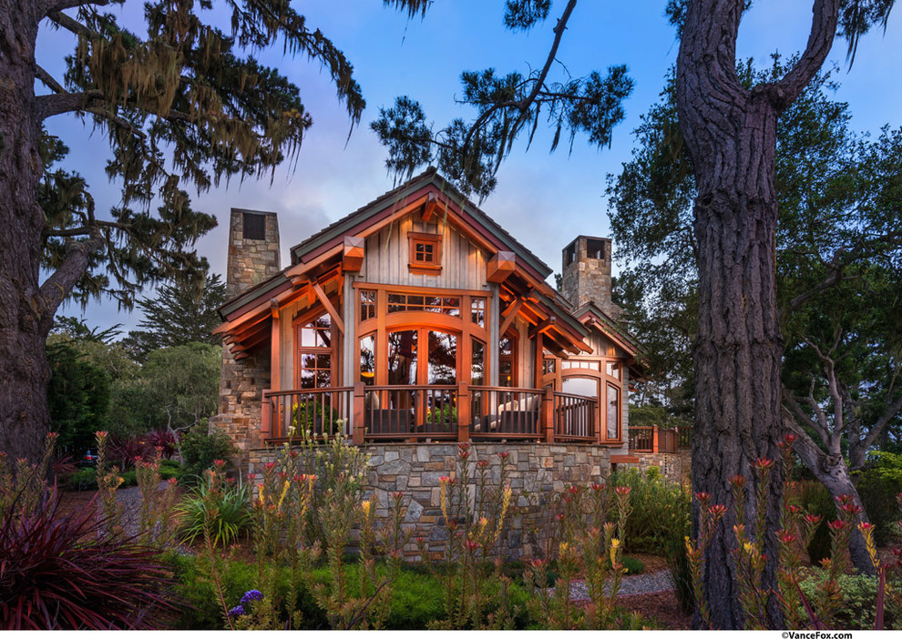 This is an example of an arts and crafts exterior in Sacramento with wood siding.