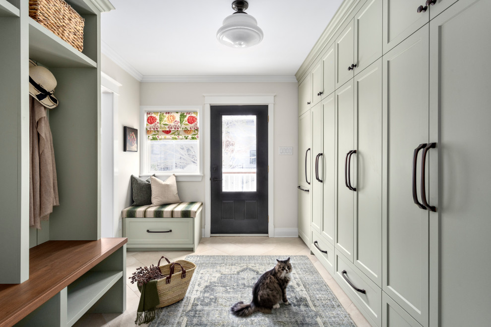 Inspiration for a mid-sized transitional porcelain tile and beige floor mudroom remodel with an undermount sink, green cabinets, quartz countertops, green backsplash, subway tile backsplash, beige walls, a side-by-side washer/dryer, white countertops and a black front door