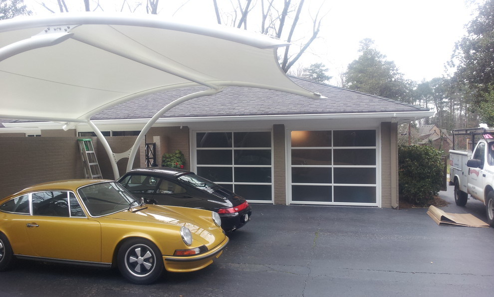 Mid-sized contemporary attached two-car garage in Atlanta.