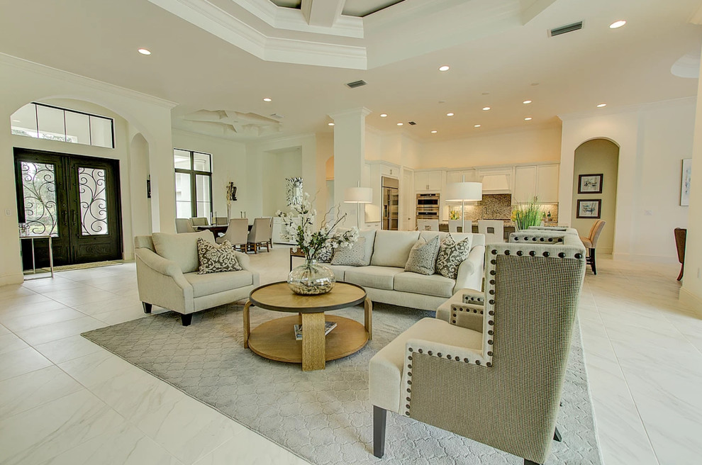 Mid-sized transitional formal open concept living room in Miami with beige walls, marble floors, no fireplace, no tv and white floor.