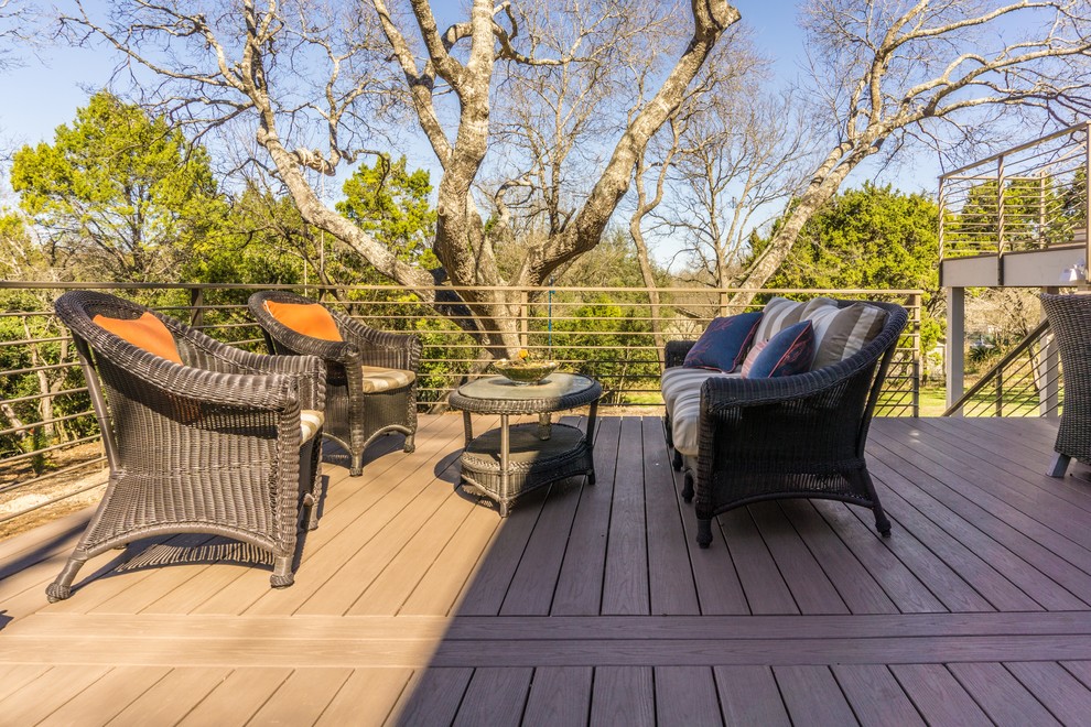 Design ideas for a large contemporary backyard deck in Austin with no cover.