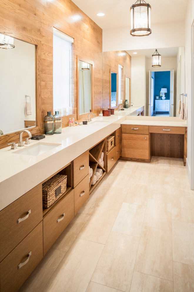Inspiration for a large contemporary master bathroom in Houston with flat-panel cabinets, light wood cabinets, a drop-in tub, an alcove shower, white tile, beige walls, light hardwood floors, an integrated sink, a hinged shower door, mirror tile, engineered quartz benchtops and beige floor.