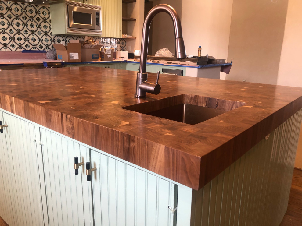 Small country u-shaped home bar in Other with an undermount sink, shaker cabinets, grey cabinets, wood benchtops, grey splashback, shiplap splashback, dark hardwood floors, brown floor and brown benchtop.