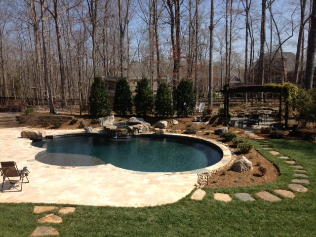 Inspiration for a rustic home design remodel in Charlotte