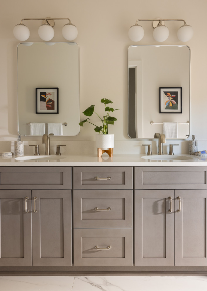 Bathroom - mid-sized transitional master porcelain tile, white floor and double-sink bathroom idea in New York with shaker cabinets, gray cabinets, white walls, an undermount sink, quartz countertops, white countertops and a built-in vanity