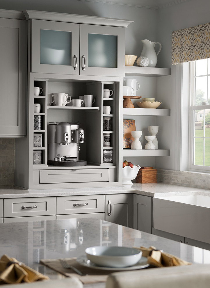 Example of a transitional kitchen design in DC Metro with a farmhouse sink, shaker cabinets, gray cabinets and quartz countertops