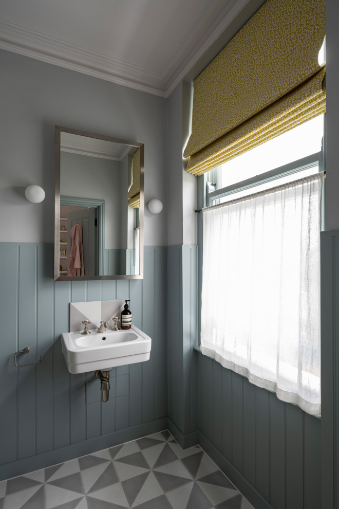 Traditional bathroom in London with marble worktops.