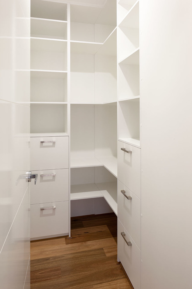 This is an example of a contemporary storage and wardrobe in Perth.