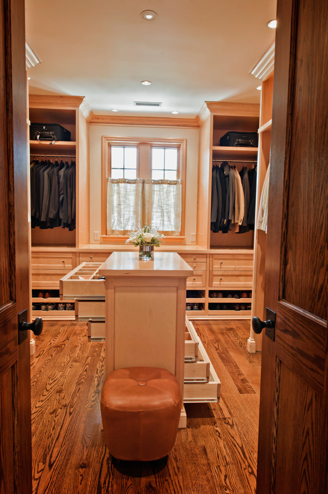 Example of a huge transitional men's light wood floor dressing room design in Nashville with shaker cabinets and light wood cabinets