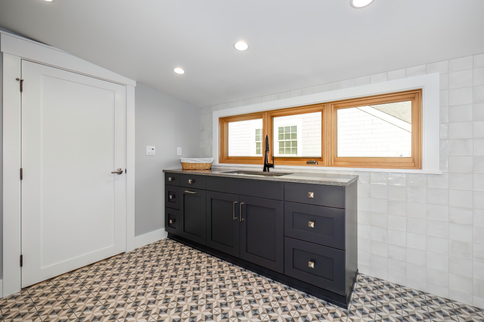 Example of a mountain style laundry room design in Seattle