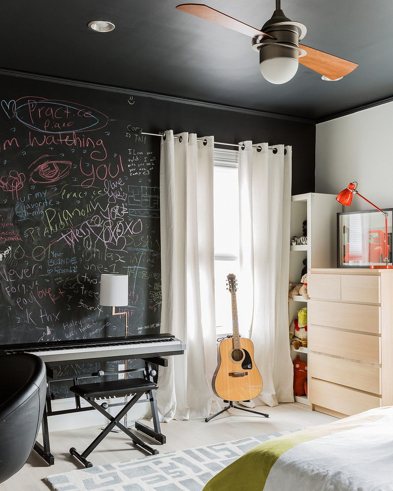 Design ideas for a mid-sized contemporary gender-neutral kids' room in Boston with multi-coloured walls.