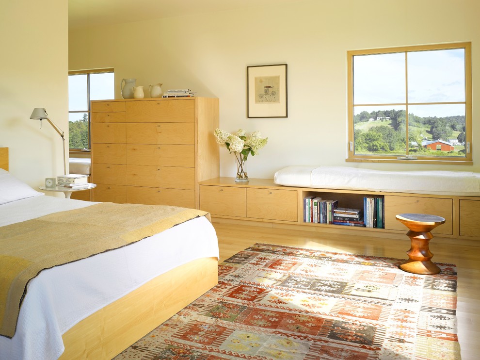 Photo of a country bedroom in Burlington with white walls.