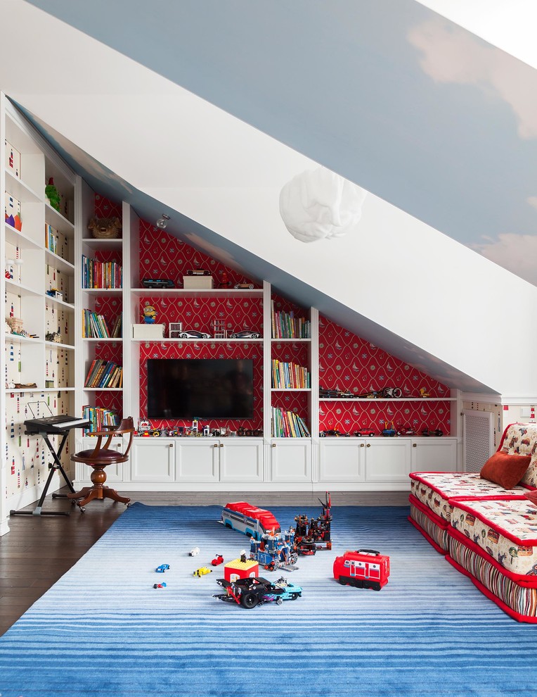 This is an example of a transitional kids' playroom for kids 4-10 years old in Moscow with red walls, dark hardwood floors and brown floor.