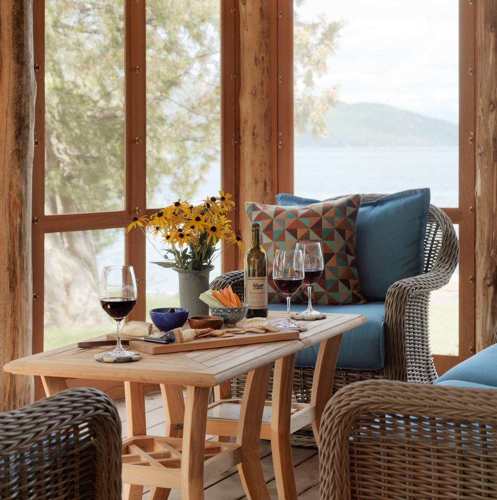This is an example of a coastal porch design in Burlington.