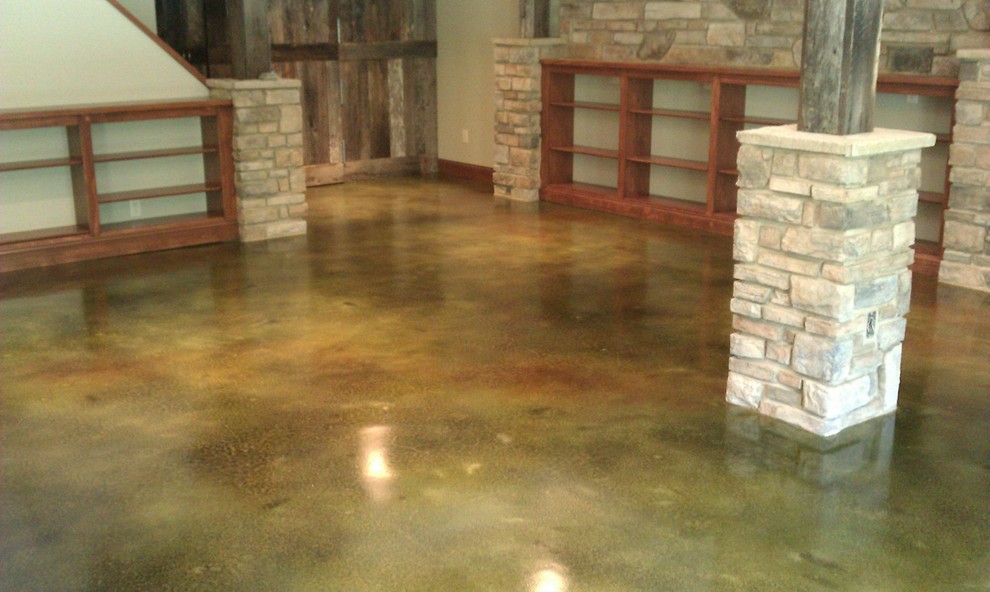 Mid-sized elegant walk-out concrete floor basement photo in St Louis with multicolored walls
