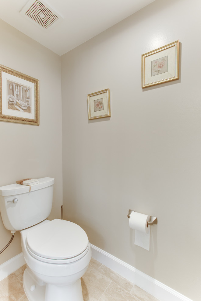 Design ideas for a large transitional powder room in DC Metro with an undermount sink and granite benchtops.