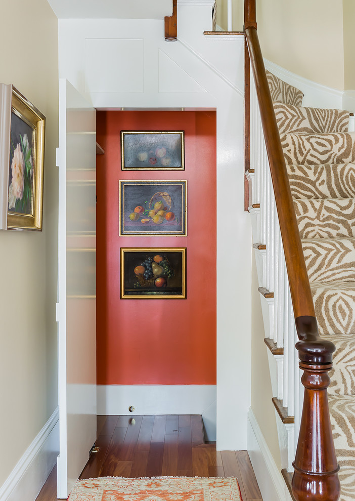 Design ideas for a small traditional hallway in Boston with beige walls and light hardwood floors.