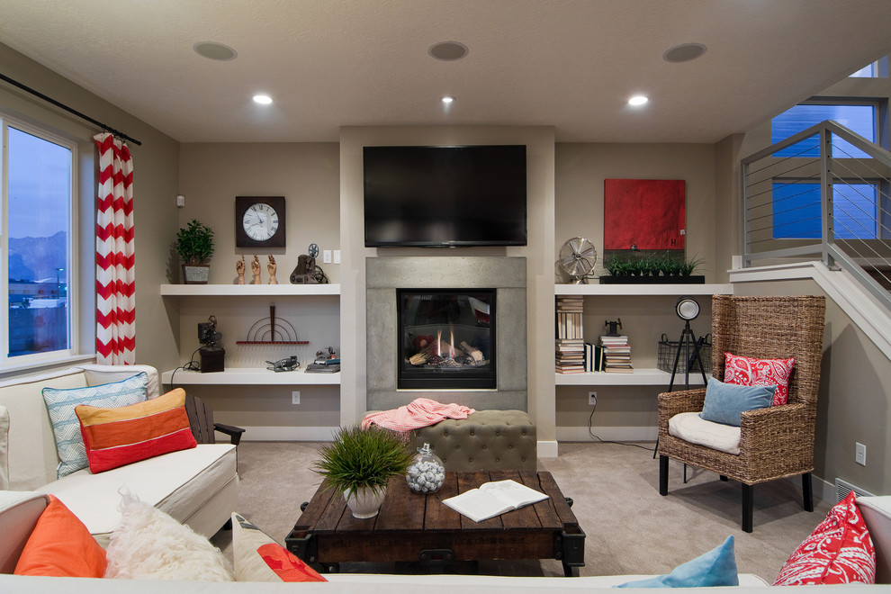 Contemporary open concept living room in Salt Lake City with a concrete fireplace surround, beige walls, carpet, a standard fireplace and a wall-mounted tv.