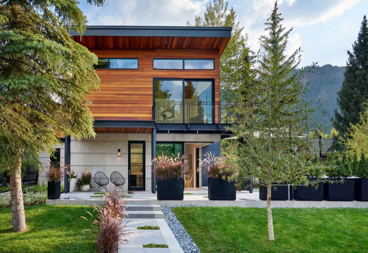 Mid-sized contemporary two-storey duplex exterior in Denver with a flat roof.
