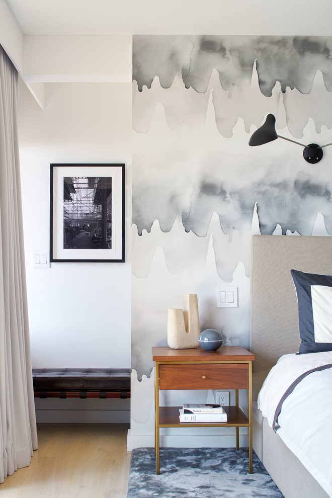 Inspiration for a midcentury bedroom in San Francisco with white walls and light hardwood floors.