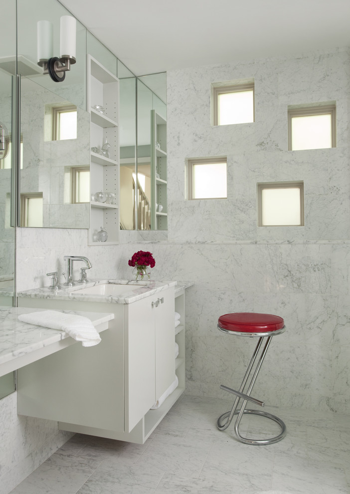 Inspiration for a contemporary 3/4 bathroom in Other with marble benchtops, flat-panel cabinets, white cabinets, an alcove shower, white tile, white walls, marble floors, marble, an undermount sink, white floor and white benchtops.