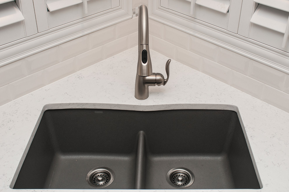Eat-in kitchen - mid-sized transitional u-shaped ceramic tile and gray floor eat-in kitchen idea in Orlando with an undermount sink, beaded inset cabinets, gray cabinets, quartz countertops, white backsplash, subway tile backsplash, stainless steel appliances and no island