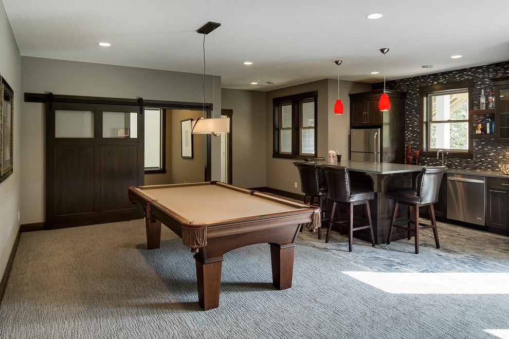 This is an example of a mid-sized transitional single-wall seated home bar in Minneapolis with an undermount sink, shaker cabinets, dark wood cabinets, zinc benchtops, brown splashback, matchstick tile splashback, slate floors and grey floor.