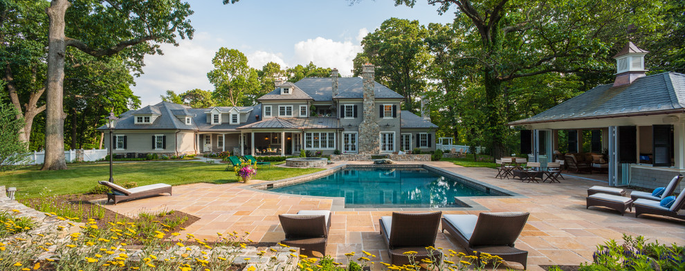 Inspiration for an american Custom-shaped swimming pool in St Louis With a Pool House.