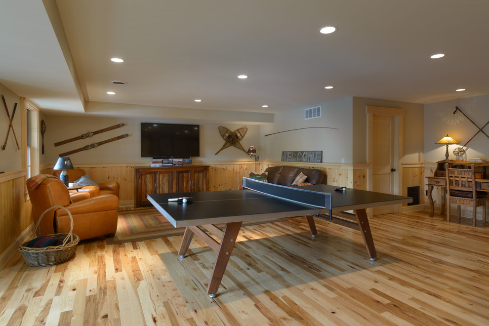 Inspiration for a large country enclosed family room in Boston with a game room, grey walls, light hardwood floors, no fireplace, no tv and beige floor.