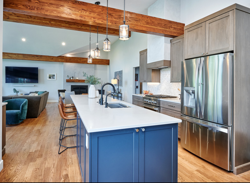 Example of a transitional kitchen design in Denver