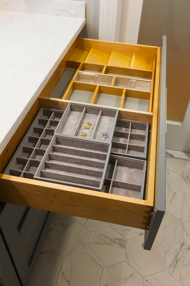 Mid-sized transitional master green tile and ceramic tile porcelain tile, white floor and double-sink sliding shower door photo with shaker cabinets, gray cabinets, a two-piece toilet, an undermount sink, quartz countertops, white countertops, a niche and a built-in vanity