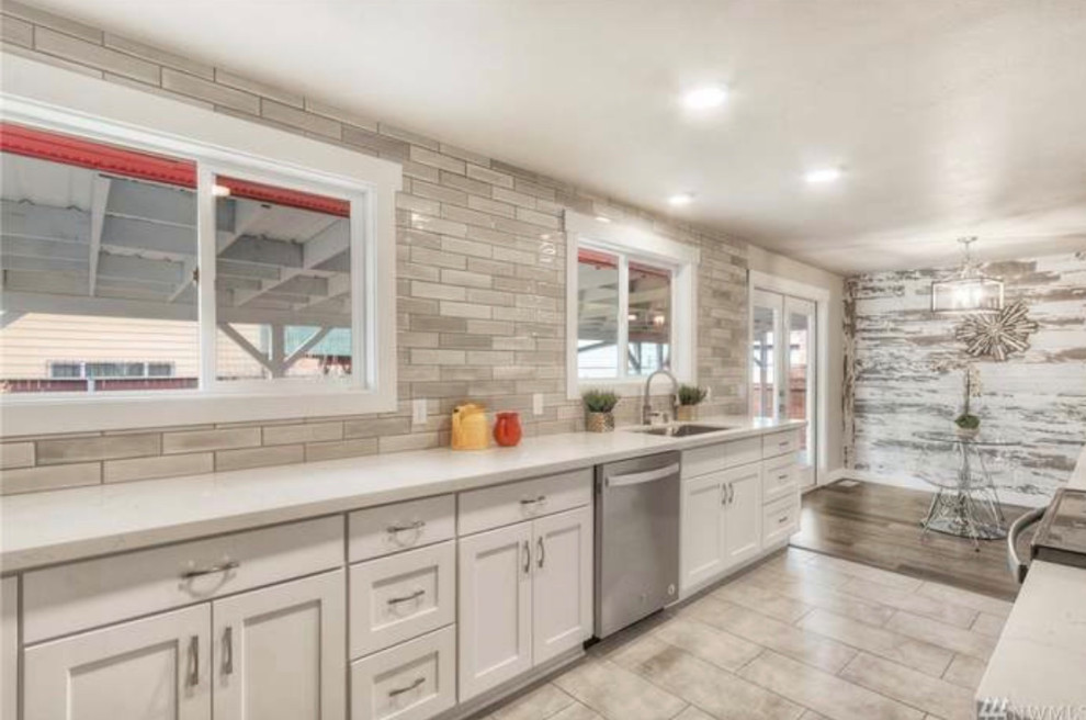 Example of a transitional kitchen design in Seattle
