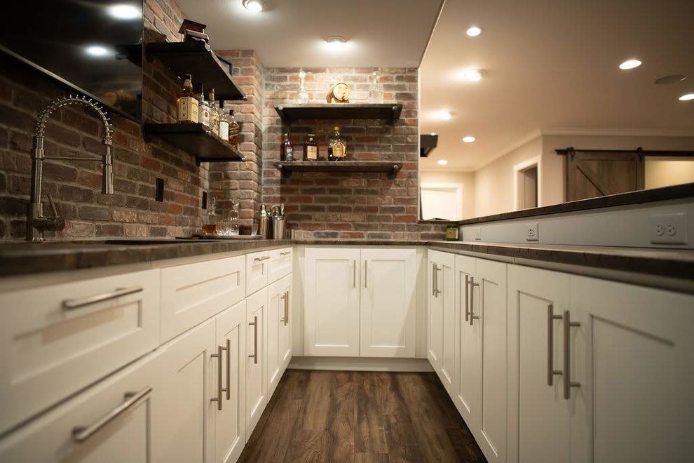 Mountain style basement photo in Milwaukee