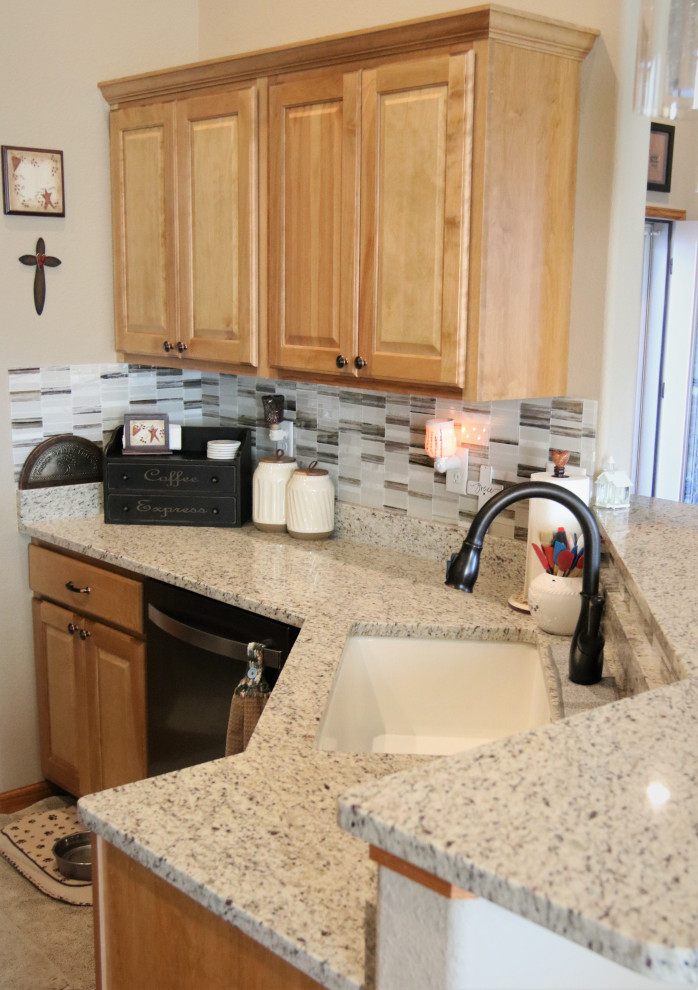 Example of a small eat-in kitchen design with granite countertops, multicolored backsplash, mosaic tile backsplash and multicolored countertops