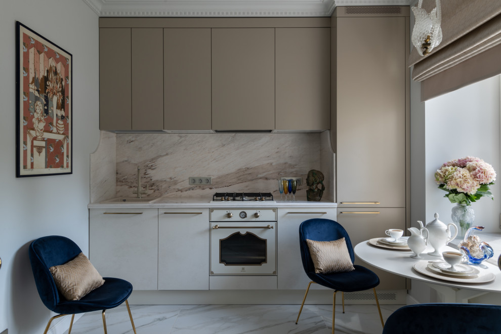 Inspiration for a transitional single-wall separate kitchen in Moscow with a drop-in sink, flat-panel cabinets, beige cabinets, beige splashback, white appliances, no island, beige floor and white benchtop.