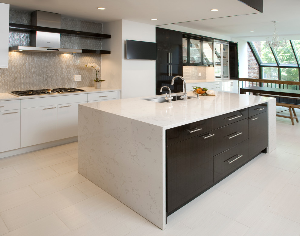 Inspiration for a mid-sized contemporary l-shaped porcelain tile eat-in kitchen remodel in Philadelphia with an undermount sink, flat-panel cabinets, white cabinets, solid surface countertops, gray backsplash, paneled appliances, white walls and an island