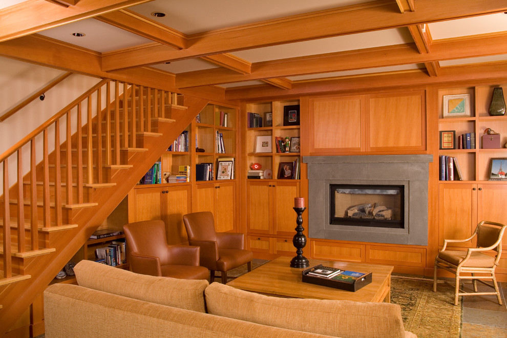 Photo of an arts and crafts living room in Seattle with a concrete fireplace surround.