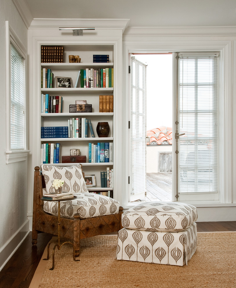 Inspiration for a mediterranean study room in Miami with white walls and medium hardwood floors.