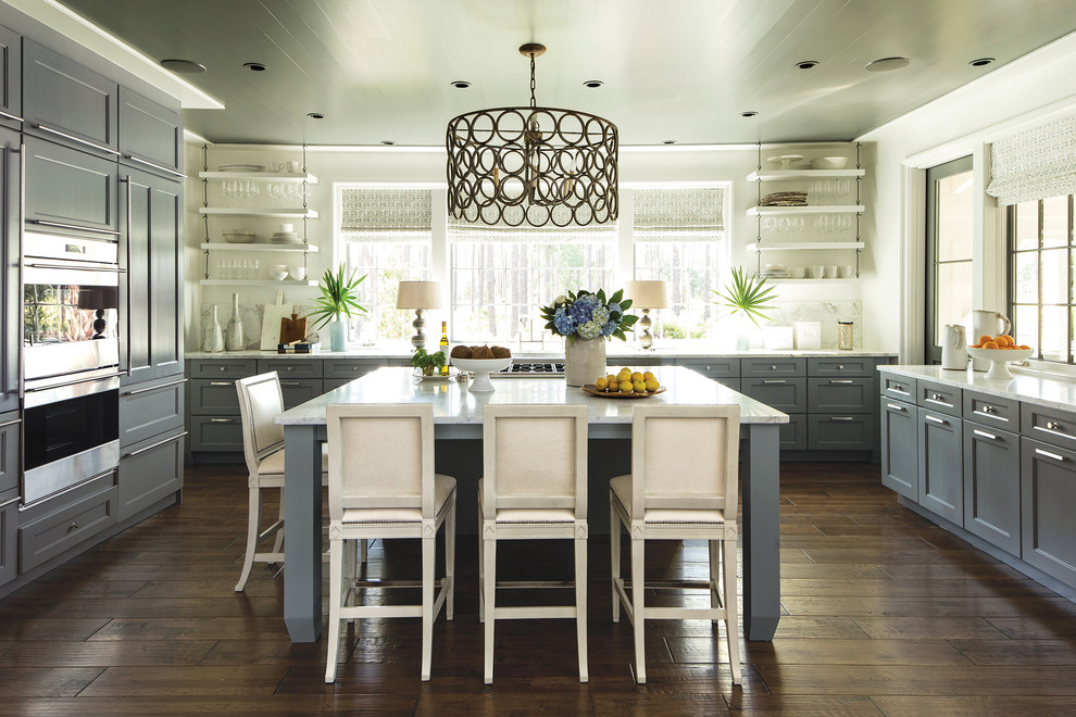 Inspiration for a large country u-shaped kitchen in Birmingham with an undermount sink, shaker cabinets, grey cabinets, quartz benchtops, stainless steel appliances, dark hardwood floors, with island, brown floor and white benchtop.