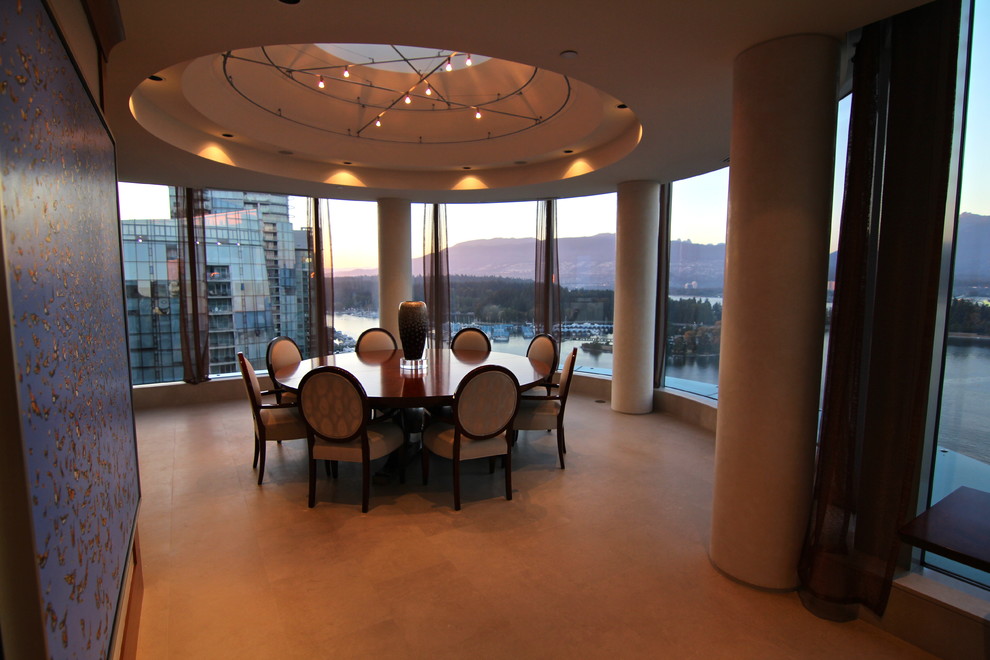 Example of a transitional dining room design in Calgary