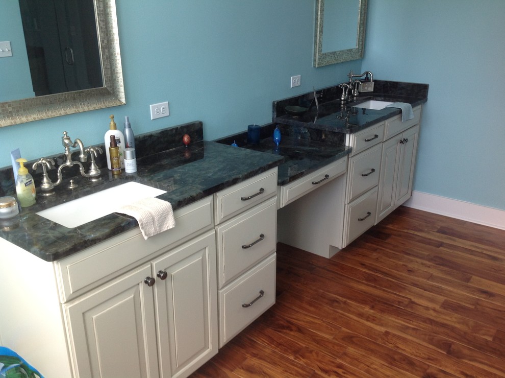 Home design - mid-sized transitional master blue tile and porcelain tile porcelain tile home design idea in Miami with raised-panel cabinets, white cabinets, blue walls, an undermount sink and granite countertops