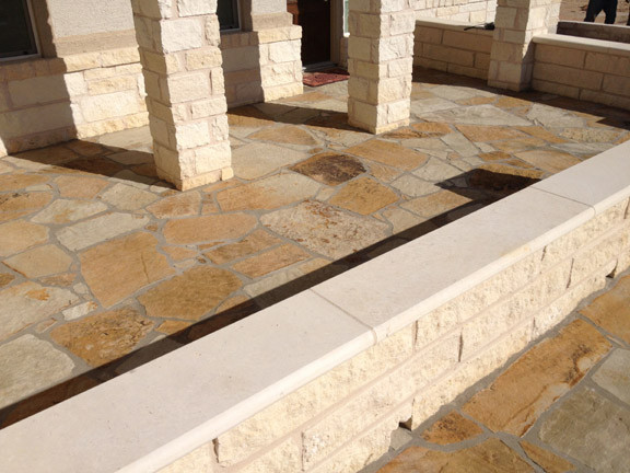 Flagstone entry with limestone seatwalls