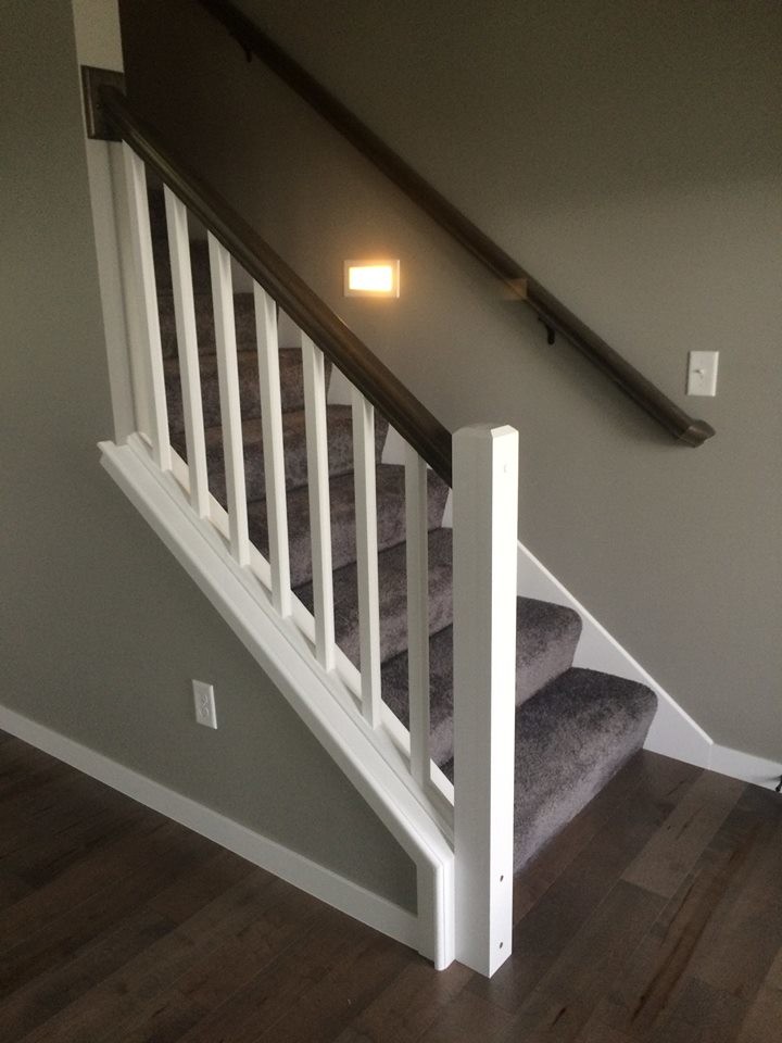Inspiration for a small transitional straight staircase in Cedar Rapids.