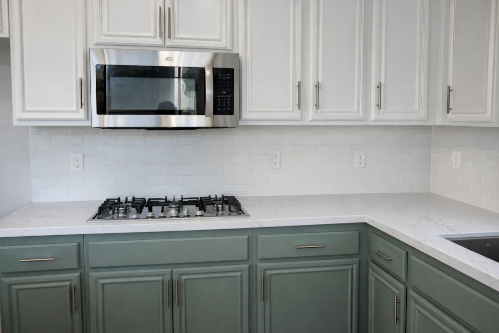 Modern kitchen with white and sage green