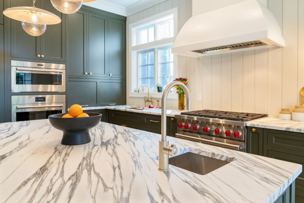 Inspiration for a mid-sized transitional l-shaped light wood floor and brown floor eat-in kitchen remodel in New York with a single-bowl sink, shaker cabinets, gray cabinets, marble countertops, white backsplash, shiplap backsplash, stainless steel appliances, an island and multicolored countertops