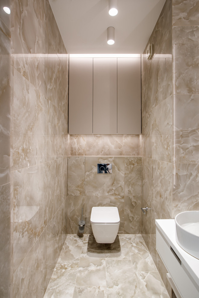 Photo of a contemporary powder room in Moscow with a wall-mount toilet.