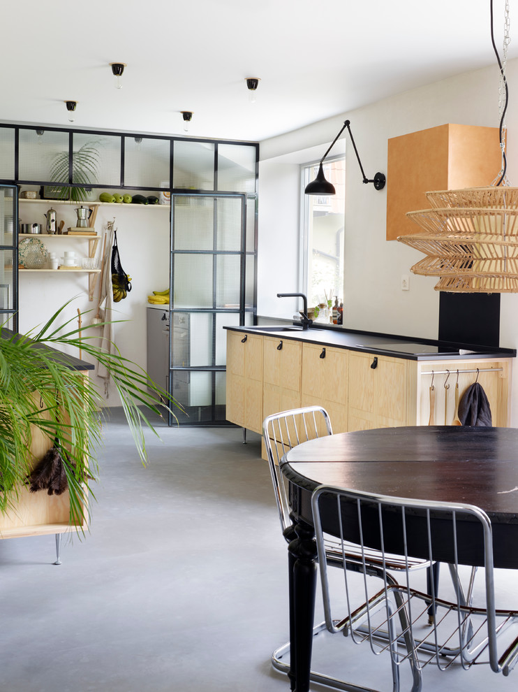 This is an example of an eclectic kitchen in Malmo.
