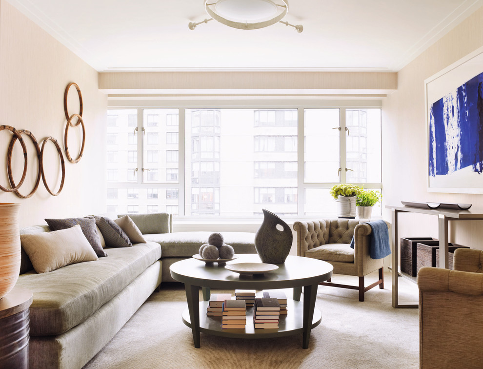 Living room - transitional carpeted living room idea in New York with beige walls