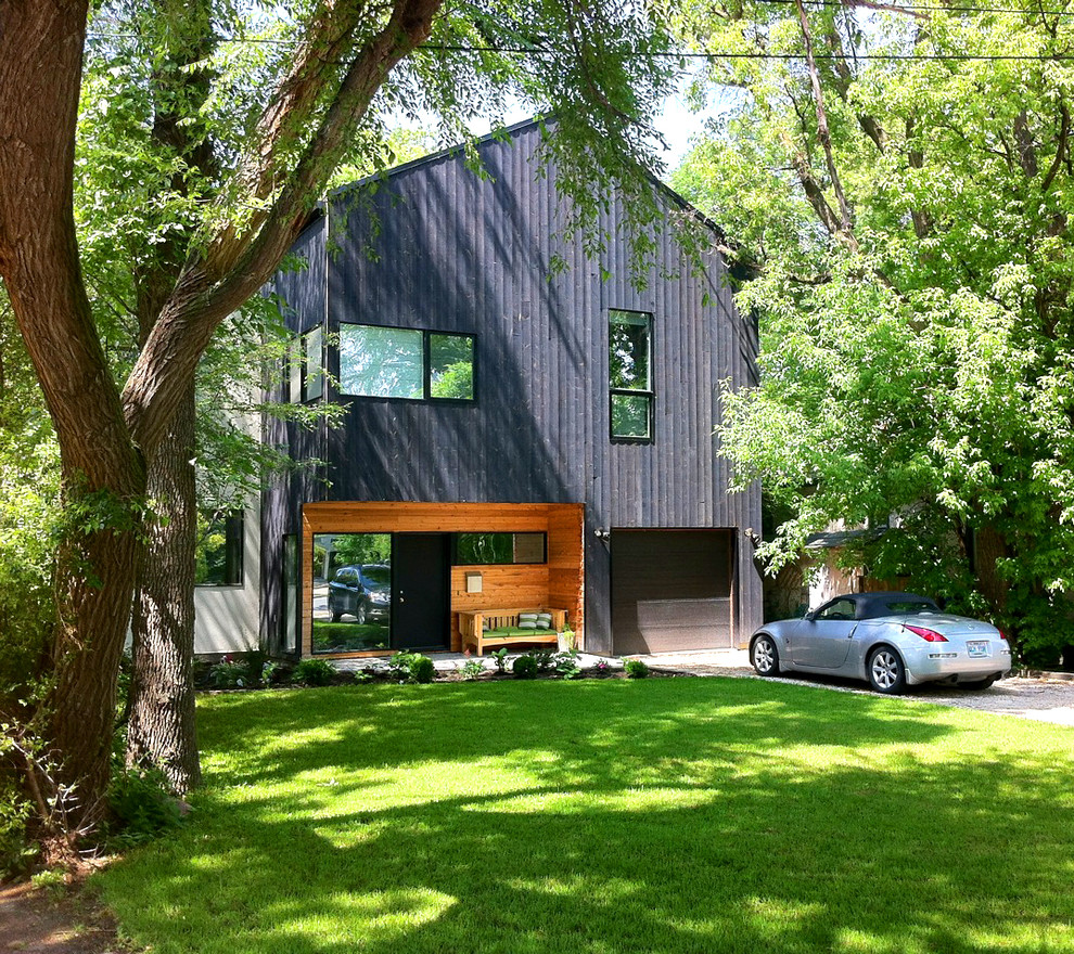Photo of a modern exterior in Other with wood siding.