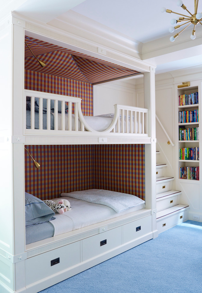 Design ideas for a traditional gender-neutral kids' room for kids 4-10 years old in New York with white walls and carpet.